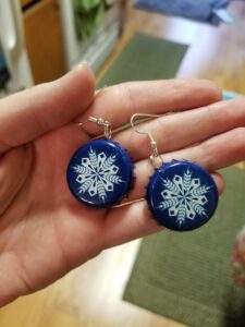dangle earrings, made from the bottle caps of Bell's Brewery Winter White Ale
