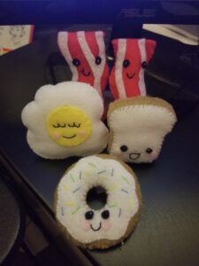 Tiny food plushies made from a Klutz-brand pattern